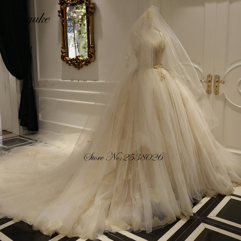 "Ballerina Inspired Champagne Spaghetti Straps Wedding Gown with Beading" - AH Boutique