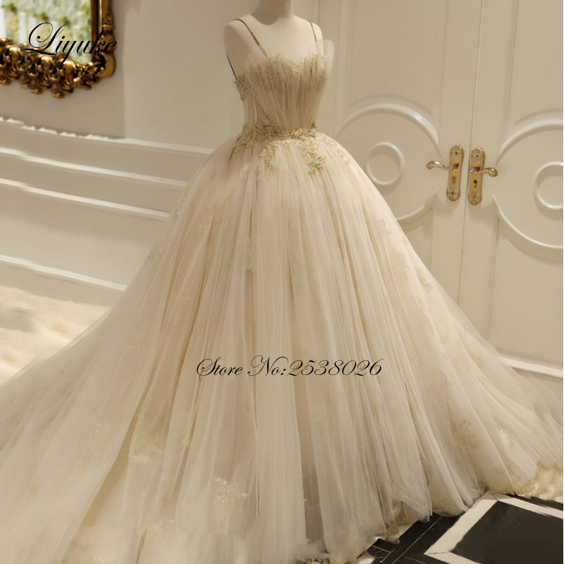 "Ballerina Inspired Champagne Spaghetti Straps Wedding Gown with Beading" - AH Boutique