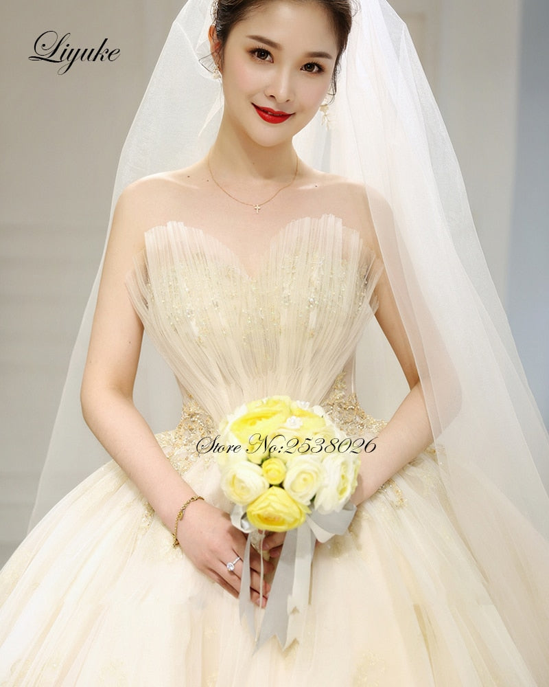 "Ballerina Inspired Champagne Spaghetti Straps Wedding Gown with Beading" - AH Boutique